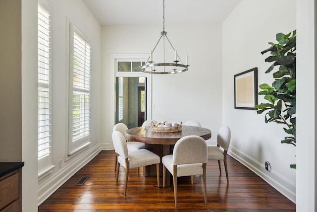 1051 W Main St, Franklin, TN 37064 - dining room with a chandelier, baseboards, and dark wood-style flooring