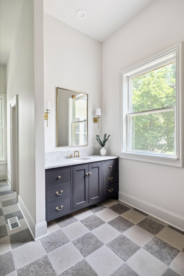 1051 W Main St, Franklin, TN 37064 - bathroom featuring vanity and baseboards