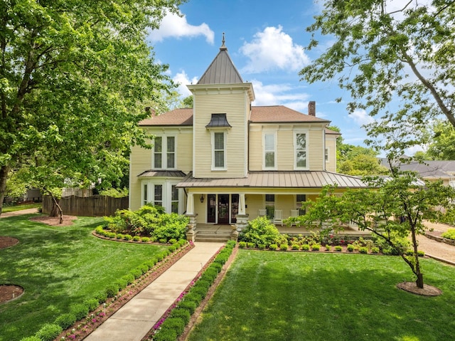 1051 W Main St, Franklin, TN 37064 - victorian home featuring a standing seam roof, metal roof, and a chimney