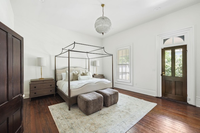 1051 W Main St, Franklin, TN 37064 - bedroom with dark wood-type flooring and baseboards