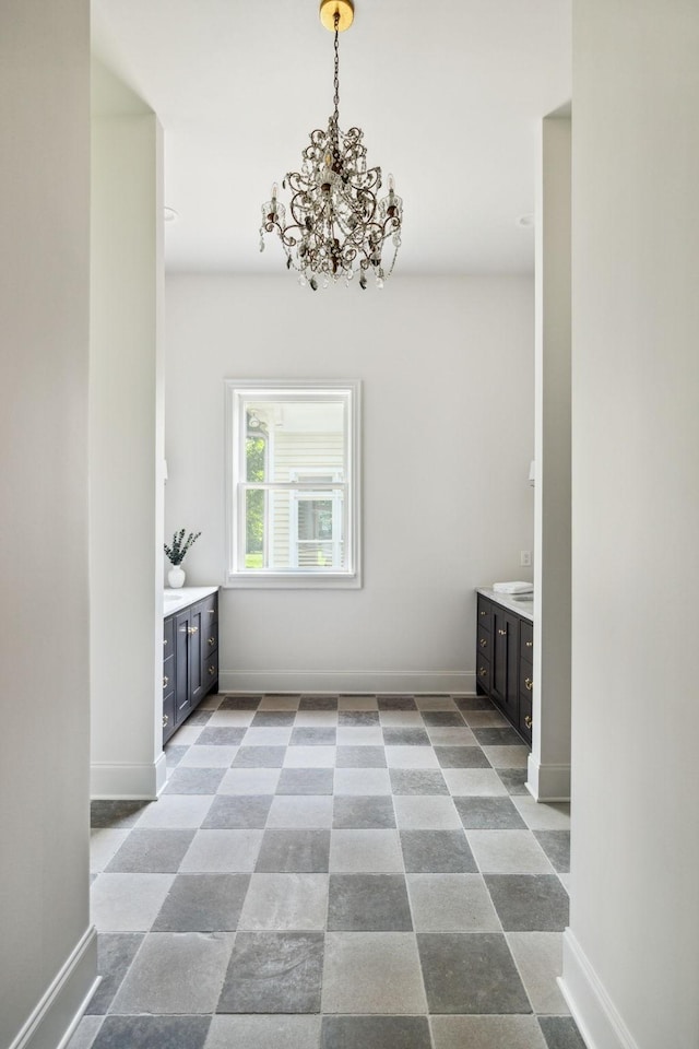 1051 W Main St, Franklin, TN 37064 - unfurnished dining area featuring a chandelier and baseboards