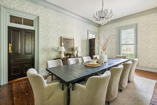 1051 W Main St, Franklin, TN 37064 - dining area with a chandelier, wood-type flooring, crown molding, baseboards, and wallpapered walls