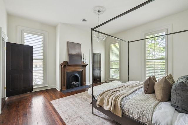 1051 W Main St, Franklin, TN 37064 - bedroom with multiple windows, hardwood / wood-style flooring, and baseboards