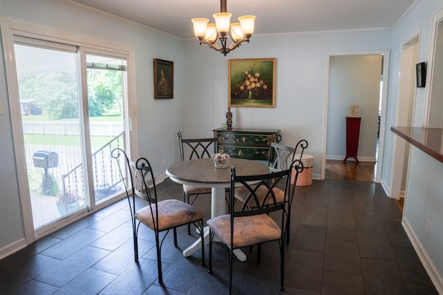 4011 Sheddan Dr, Columbia, TN 38401 - dining room with crown molding, a chandelier, and baseboards