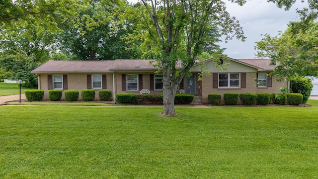4011 Sheddan Dr, Columbia, TN 38401 - single story home with a front yard and brick siding