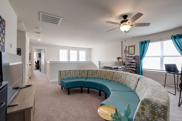 308 Whisper Wood Way, Lebanon, TN 37087 - living area featuring light carpet, ceiling fan, and baseboards