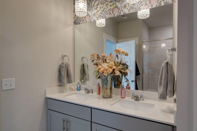 308 Whisper Wood Way, Lebanon, TN 37087 - full bath featuring a stall shower, double vanity, and a chandelier
