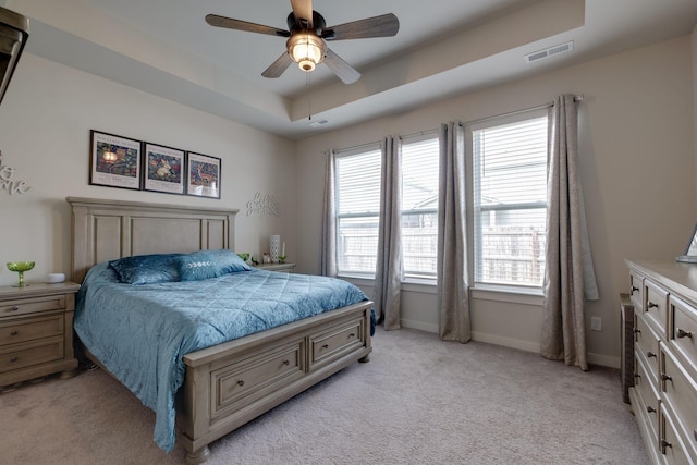 308 Whisper Wood Way, Lebanon, TN 37087 - bedroom with light carpet, baseboards, ceiling fan, and a tray ceiling