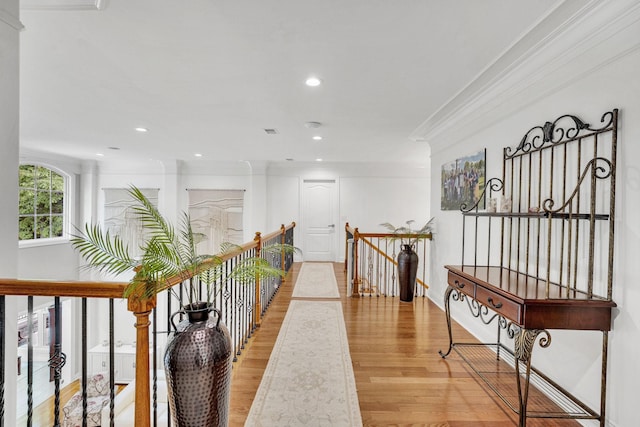6948 Whispering Oaks Dr, Springfield, TN 37172 - corridor with an upstairs landing, ornamental molding, light wood-type flooring, and recessed lighting
