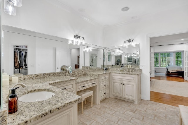 6948 Whispering Oaks Dr, Springfield, TN 37172 - bathroom featuring ornamental molding, two vanities, ensuite bathroom, and a shower