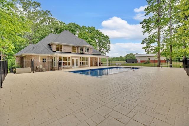 6948 Whispering Oaks Dr, Springfield, TN 37172 - view of swimming pool with french doors and a patio