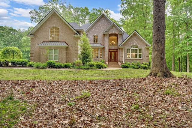 6948 Whispering Oaks Dr, Springfield, TN 37172 - view of front of home with brick siding and a front lawn