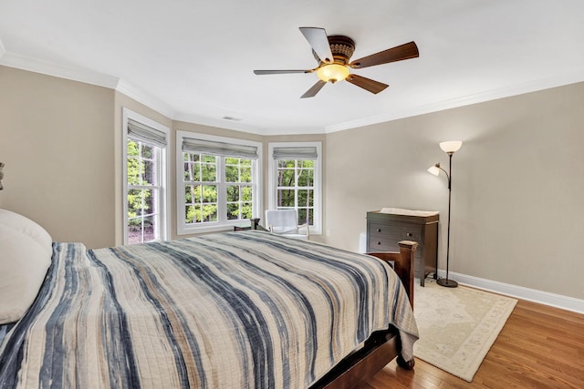 6948 Whispering Oaks Dr, Springfield, TN 37172 - bedroom featuring baseboards, wood finished floors, ornamental molding, and ceiling fan