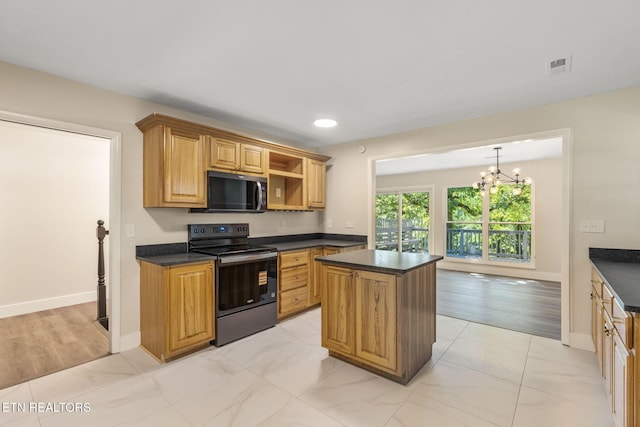 17 Westover Dr, Oak Ridge, TN 37830 - kitchen featuring range with electric cooktop, dark countertops, stainless steel microwave, a kitchen island, and recessed lighting