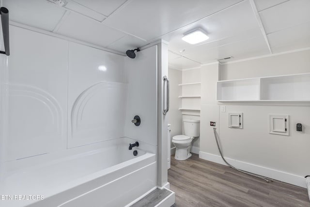 17 Westover Dr, Oak Ridge, TN 37830 - bathroom featuring toilet,  shower combination, wood finished floors, and baseboards