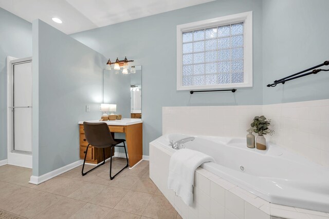 1034 Ridglea Dr, Burns, TN 37029 - bathroom with vanity, baseboards, a tub with jets, tile patterned flooring, and a shower stall