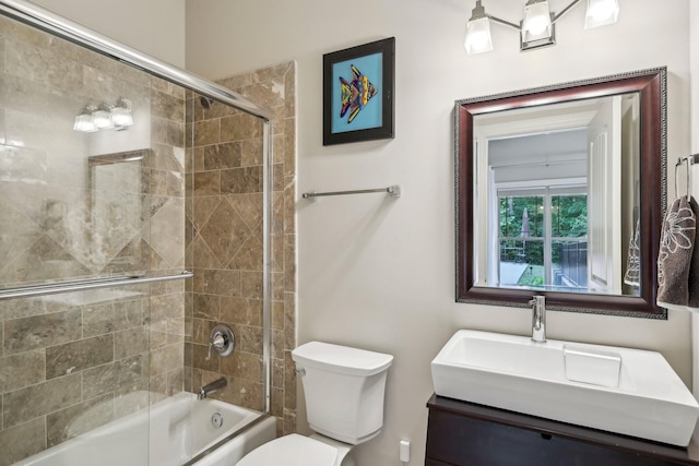 1313 Ridge Rd, Dickson, TN 37055 - full bath featuring toilet, bath / shower combo with glass door, and vanity
