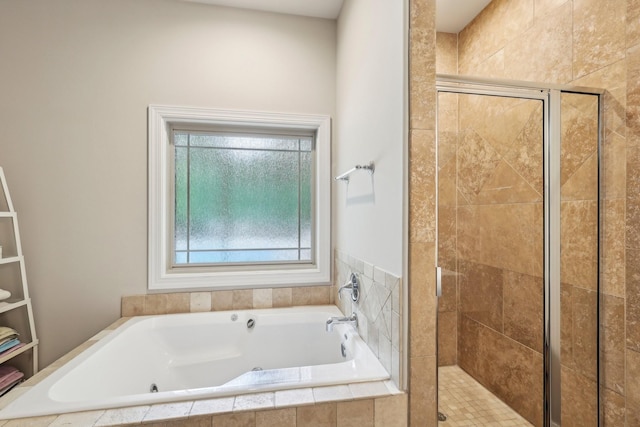 1313 Ridge Rd, Dickson, TN 37055 - bathroom featuring a stall shower and a garden tub
