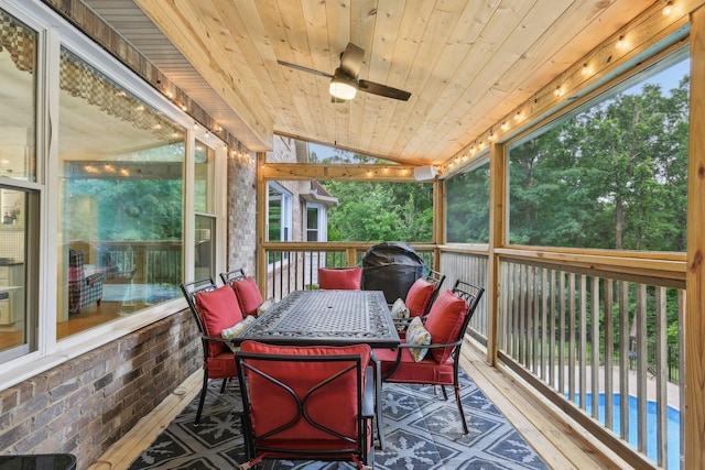 1313 Ridge Rd, Dickson, TN 37055 - wooden terrace with a ceiling fan, outdoor dining area, and an outdoor pool