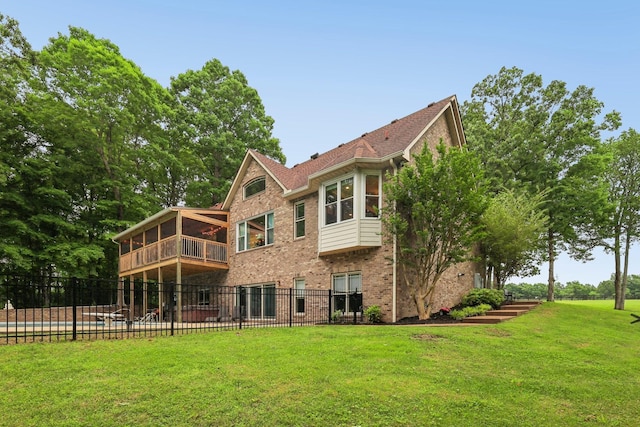 1313 Ridge Rd, Dickson, TN 37055 - rear view of property with brick siding and a sunroom