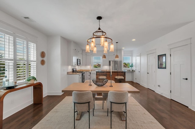 801 Lancaster Way, Nashville, TN 37212 - dining space with dark wood finished floors, a chandelier, baseboards, and recessed lighting