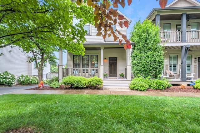 801 Lancaster Way, Nashville, TN 37212 - view of front facade featuring covered porch, a balcony, and a front lawn