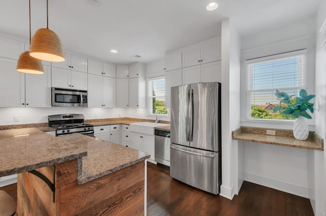 801 Lancaster Way, Nashville, TN 37212 - kitchen featuring stainless steel appliances, a sink, white cabinets, dark wood-style floors, and recessed lighting