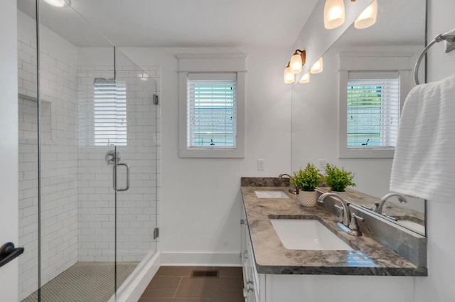 801 Lancaster Way, Nashville, TN 37212 - bathroom with plenty of natural light, a stall shower, baseboards, and tile patterned flooring