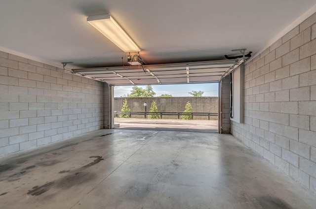 801 Lancaster Way, Nashville, TN 37212 - garage with a garage door opener and concrete block wall