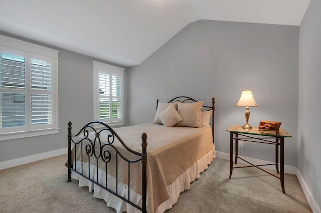 801 Lancaster Way, Nashville, TN 37212 - bedroom featuring vaulted ceiling, carpet, and baseboards