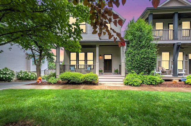 801 Lancaster Way, Nashville, TN 37212 - back of property featuring a porch, a lawn, and a balcony