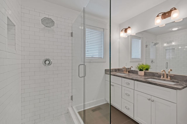 801 Lancaster Way, Nashville, TN 37212 - bathroom featuring a shower stall, tile patterned flooring, and double vanity