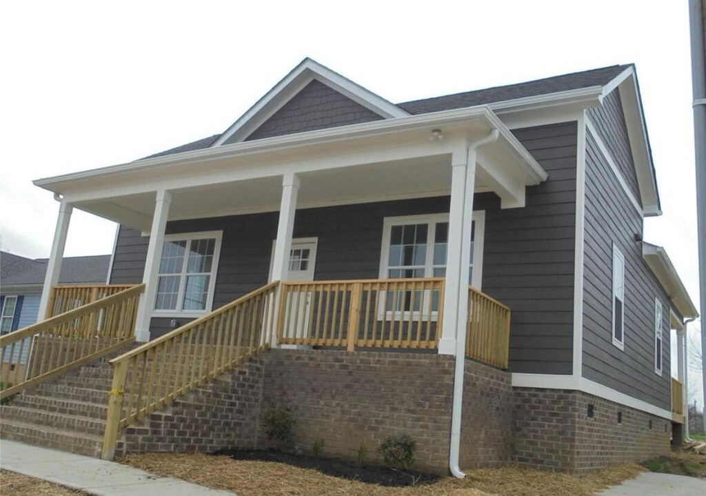 4212 Cain Ave, Chattanooga, TN 37410 - view of front of property featuring a porch and stairway
