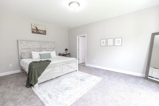 222 Preacher Roberson Rd, Castalian Springs, TN 37031 - bedroom featuring light carpet and baseboards