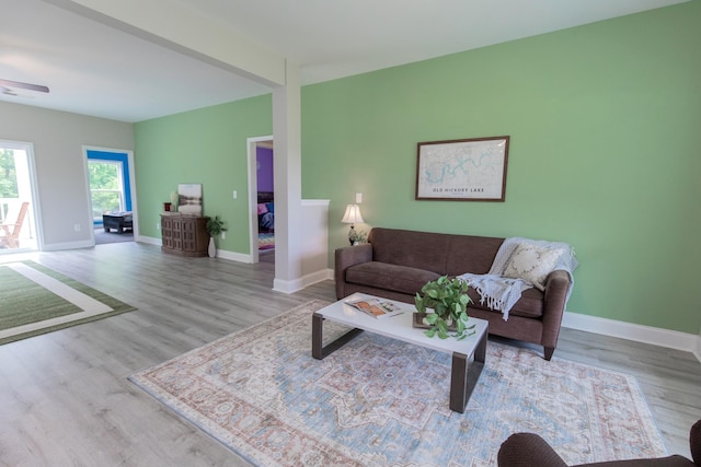 222 Preacher Roberson Rd, Castalian Springs, TN 37031 - living room featuring wood finished floors, baseboards, and ceiling fan