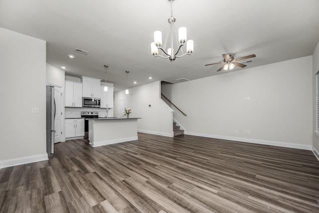 818 Arrington Way, Columbia, TN 38401 - unfurnished living room featuring dark wood-style flooring, stairs, recessed lighting, a chandelier, and ceiling fan