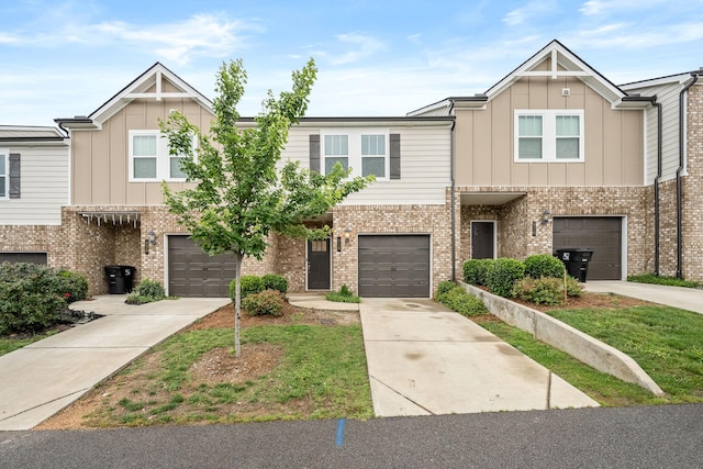 818 Arrington Way, Columbia, TN 38401 - multi unit property with board and batten siding, concrete driveway, brick siding, and an attached garage