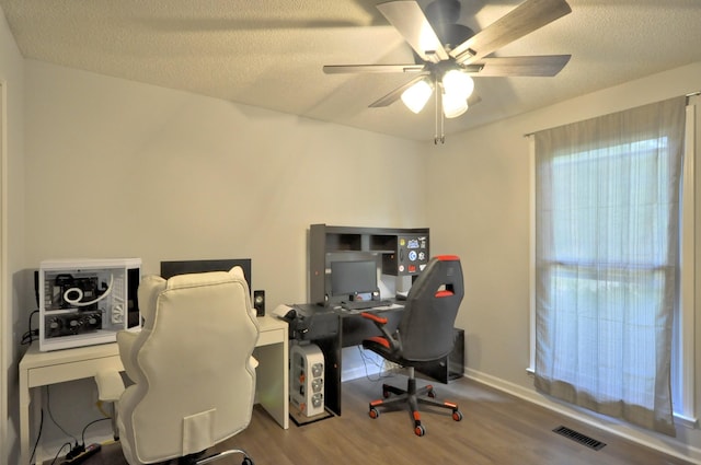 441 Bluff Dr, Clarksville, TN 37043 - office area with wood finished floors, ceiling fan, a textured ceiling, and baseboards