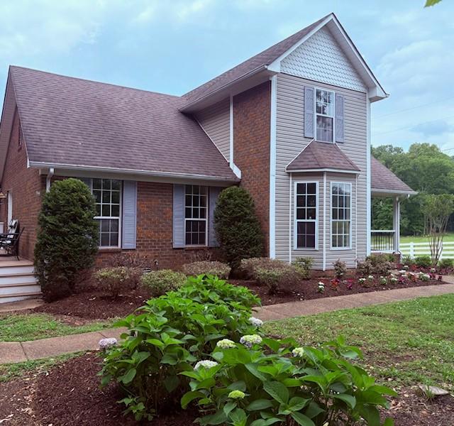 2391 Double Branch Rd, Columbia, TN 38401 - view of front of house featuring brick siding and roof with shingles