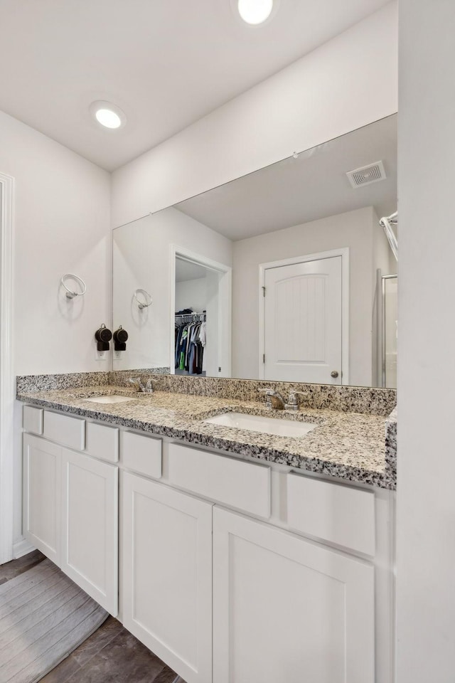 866 Long Leaf Rd, Lebanon, TN 37087 - full bath featuring double vanity, a shower stall, wood finished floors, and a walk in closet