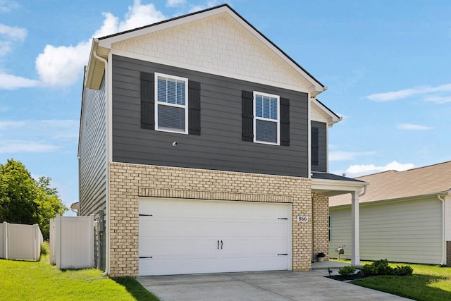866 Long Leaf Rd, Lebanon, TN 37087 - view of front of home with a garage, concrete driveway, and brick siding