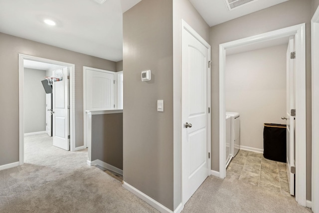 866 Long Leaf Rd, Lebanon, TN 37087 - corridor with independent washer and dryer, light carpet, and baseboards