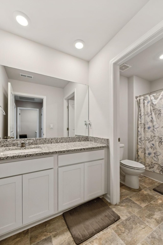 866 Long Leaf Rd, Lebanon, TN 37087 - bathroom with toilet, double vanity, stone finish floors, and a shower with shower curtain