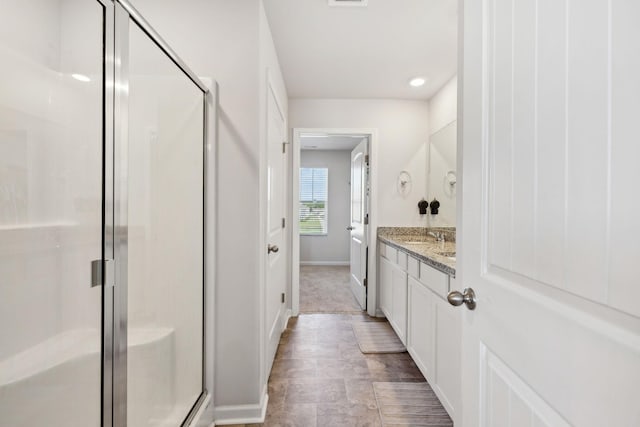 866 Long Leaf Rd, Lebanon, TN 37087 - full bathroom with a stall shower, vanity, baseboards, and recessed lighting