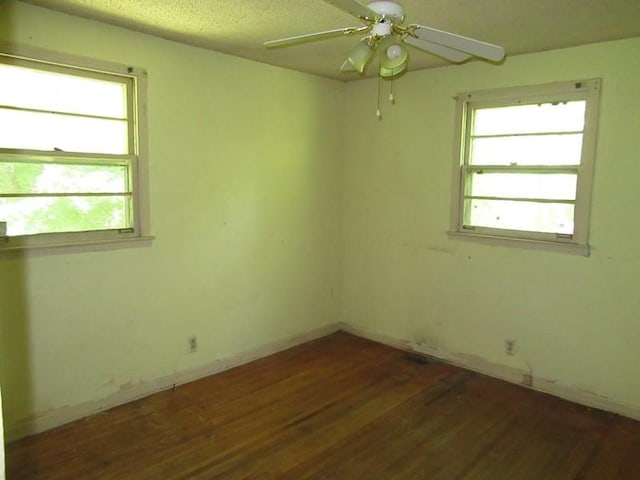 107 Jay Cir, Clarksville, TN 37040 - empty room with wood finished floors, a ceiling fan, and baseboards