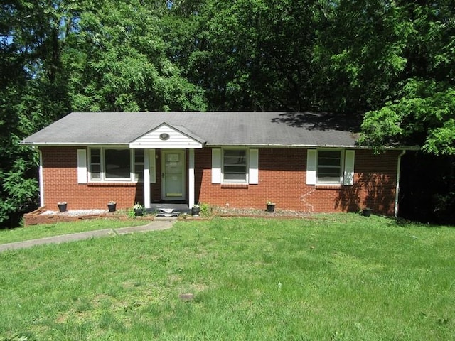 107 Jay Cir, Clarksville, TN 37040 - ranch-style house with brick siding and a front lawn