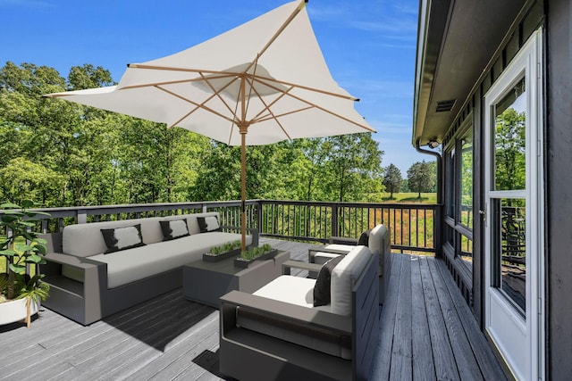 2993 Hobbitshire Dr, Centerville, TN 37033 - deck with an outdoor living space and view of wooded area
