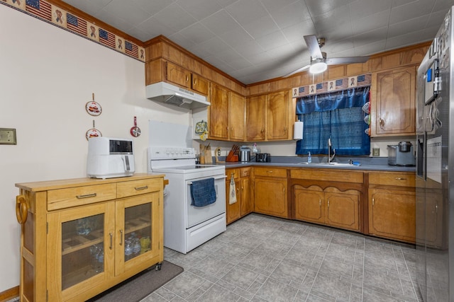 4409 Carter Dr, Nunnelly, TN 37137 - kitchen featuring white range with electric stovetop, a sink, under cabinet range hood, brown cabinetry, and a ceiling fan