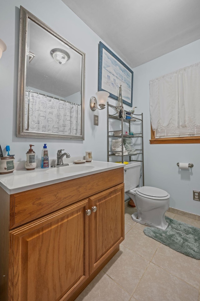 4409 Carter Dr, Nunnelly, TN 37137 - bathroom featuring tile patterned flooring, toilet, and vanity