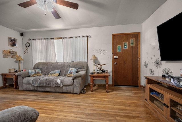 4409 Carter Dr, Nunnelly, TN 37137 - living area with ceiling fan, light wood-style floors, and baseboards